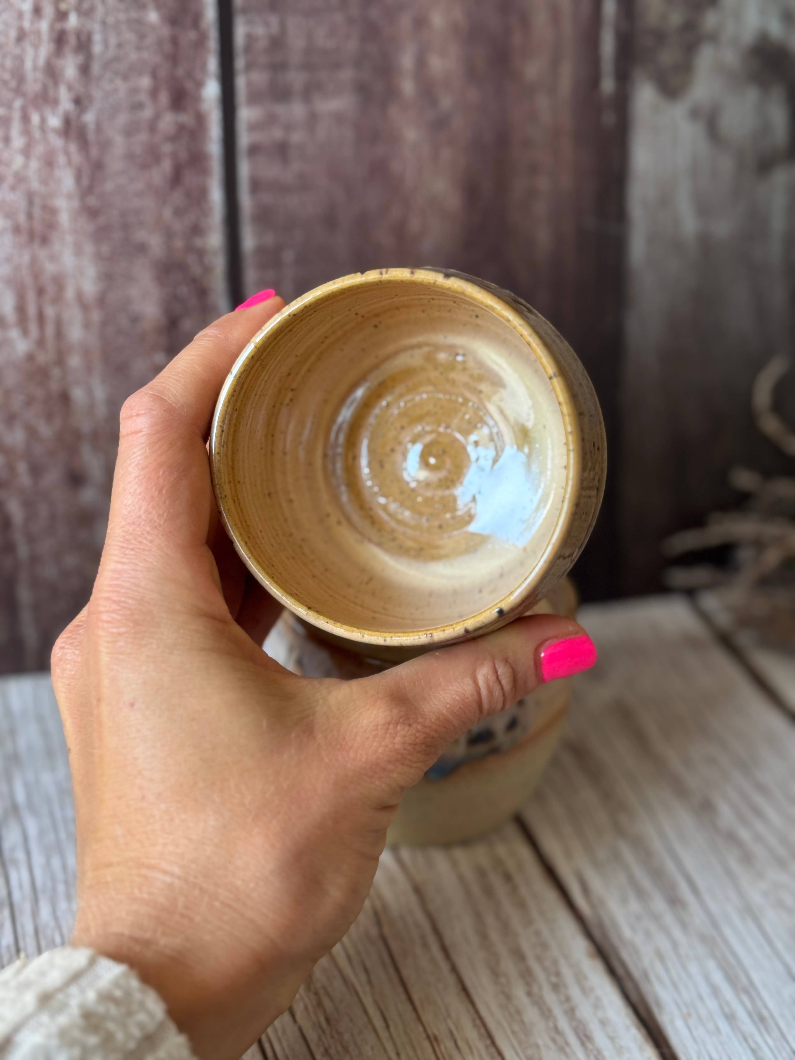 Mini hug mug in soft orange with brown spots