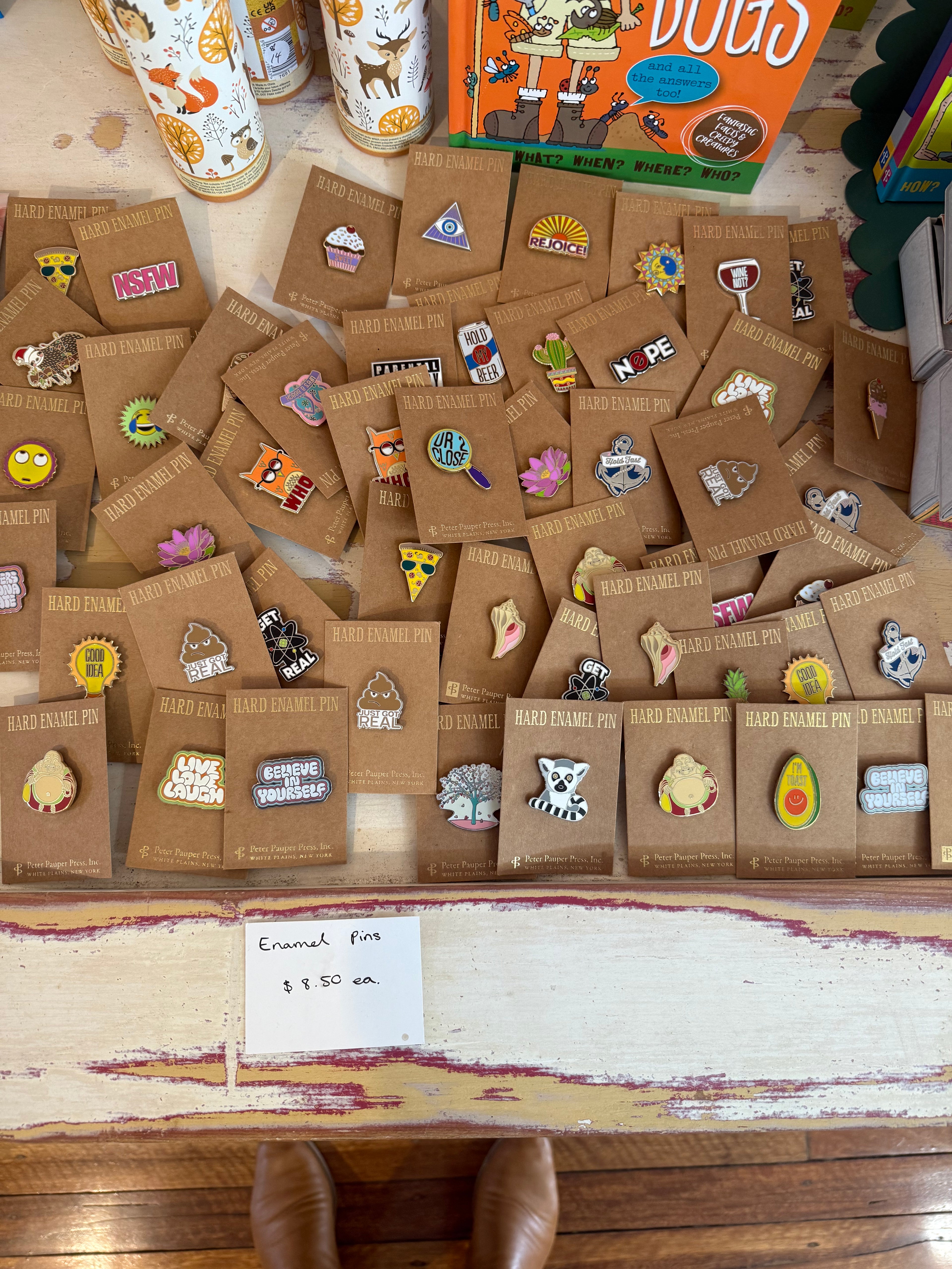 Assorted enamel pins