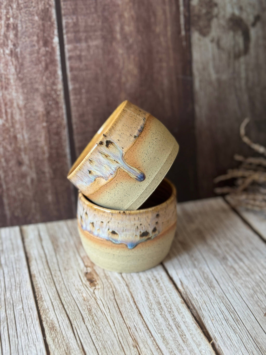 Mini hug mug in soft orange with brown spots