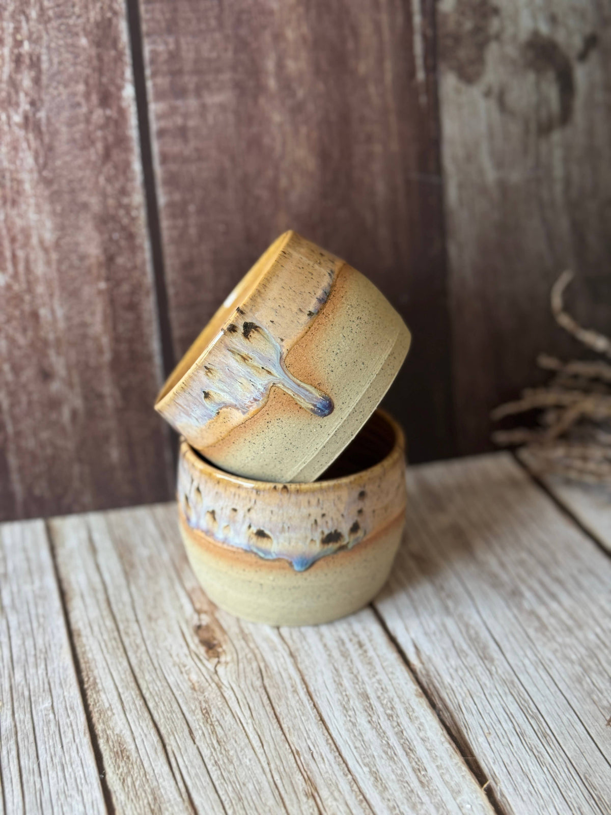 Mini hug mug in soft orange with brown spots
