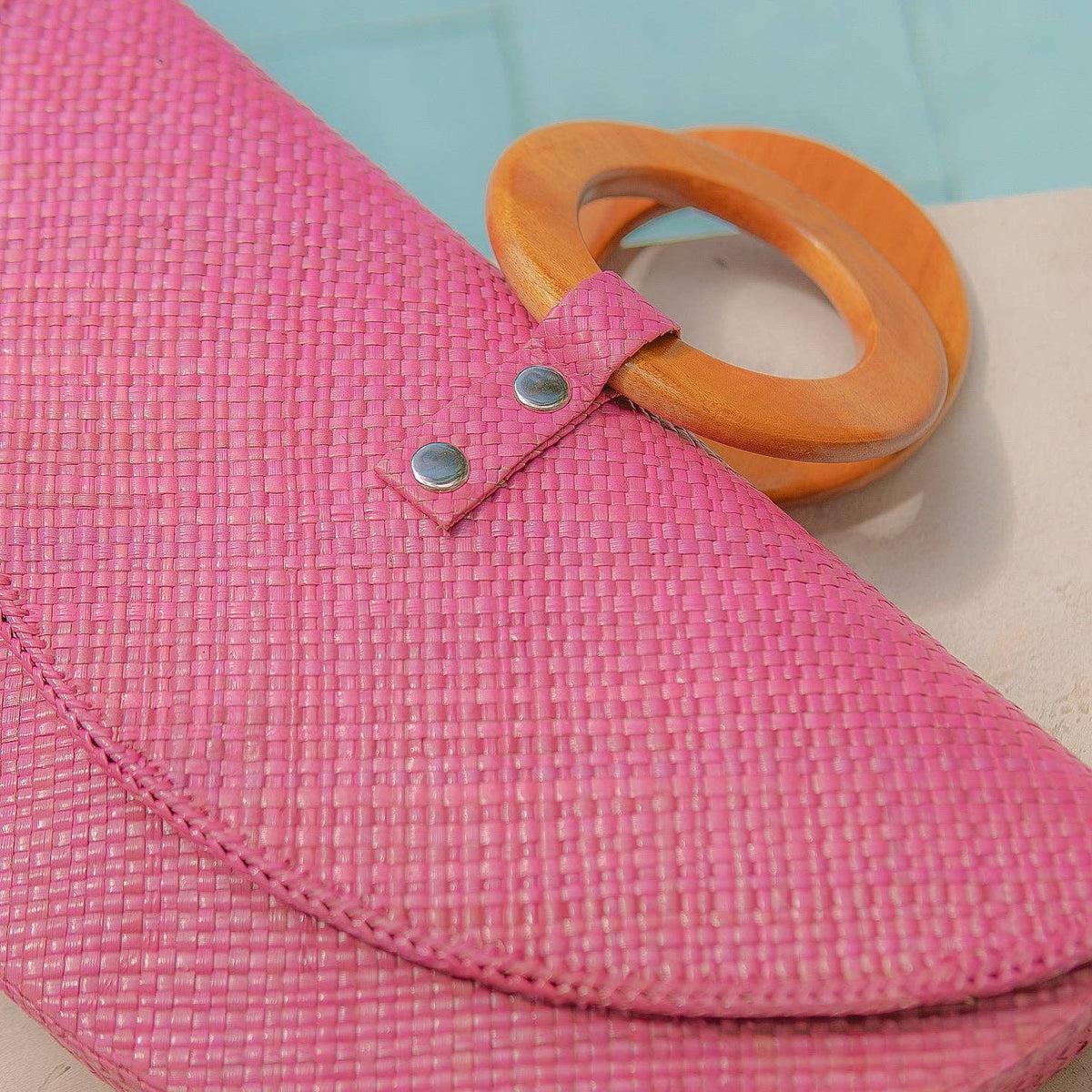 Pink Paloma Bag – Handwoven Pink Pandan Clutch with Wood Handle
